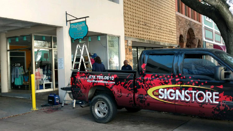 Sign store truck on location