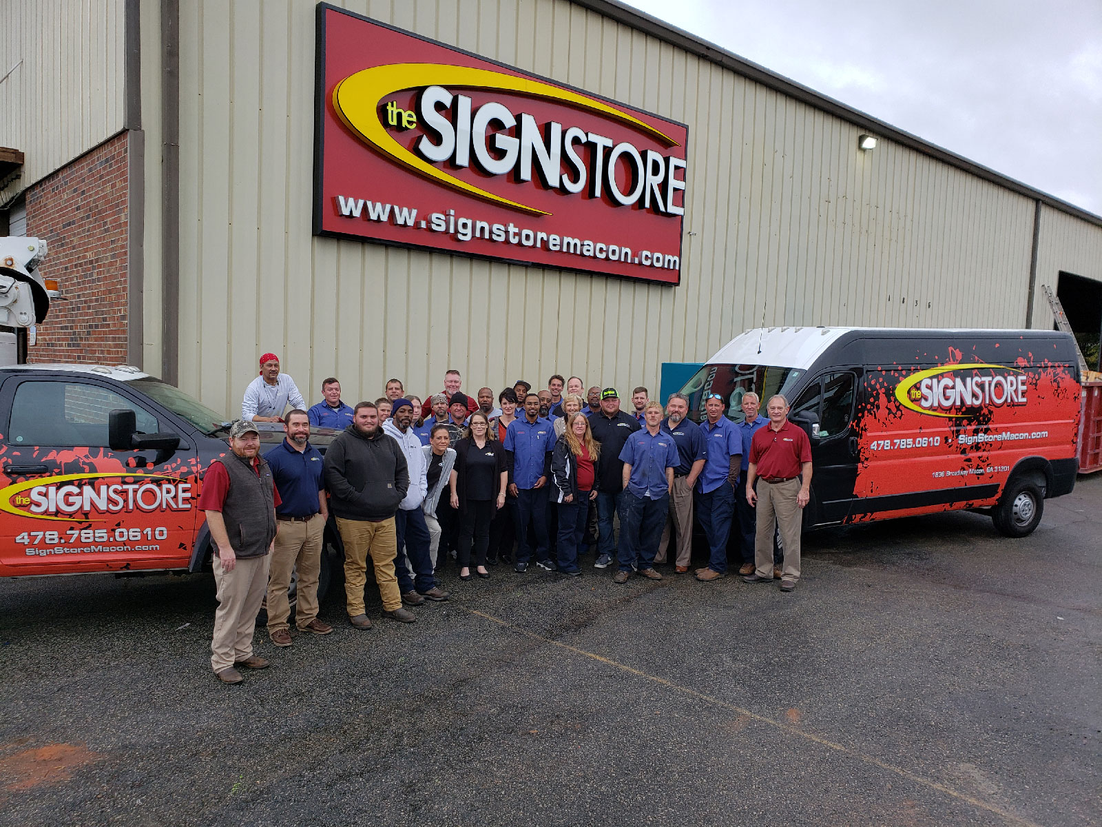 Exterior Photo of The Sign Store and Employees