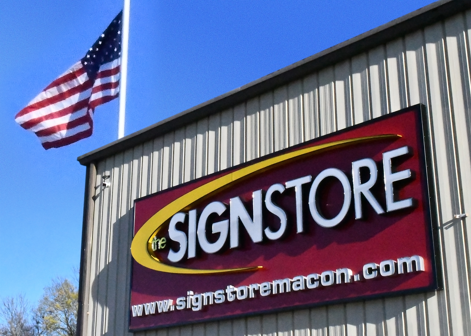 Exterior Photo of The Sign Store and Employees